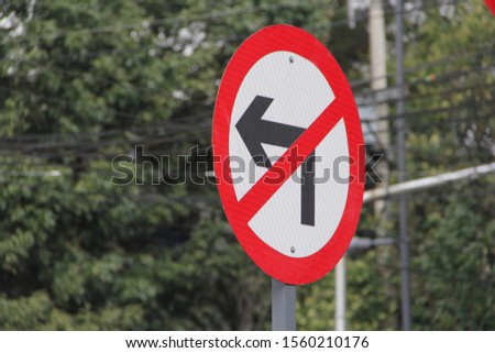 road signs with forbidden arrows
