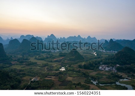 Drone Sunset View of Guilin, Li River and Karst mountains, Guilin city, Guangxi, province, China