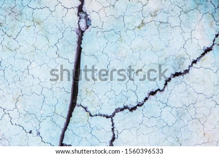 Close up of crack soil and muddy in the dry season textures, hot summer. Patterns and texture cracked soil of sunny dried earth soil, Drought of the ground. Dried cracked earth soil ground background