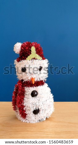 cute a snow man ornament of christmas tree