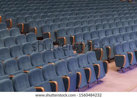 velvet seats for spectators in the theater or cinema