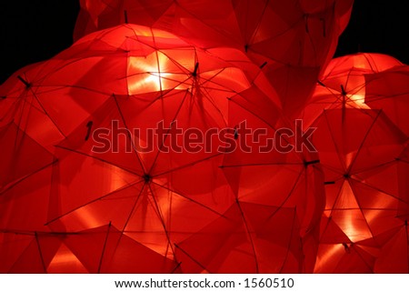 Red umbrellas forming a ball lantern