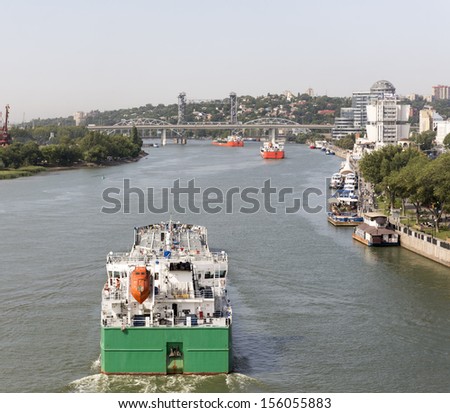 Multi-colored ships pass under the drawbridge in Rostov-on-Don