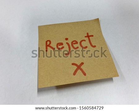Reject decision concept on sticky note. Business concept.