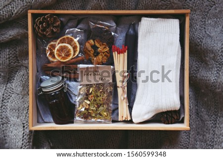 Winter cozy hygge box set on the grey background 