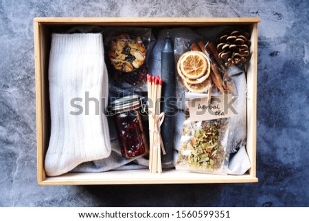 Winter cozy hygge box set on the grey background 