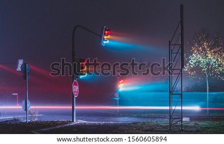 traffic light in foggy night
