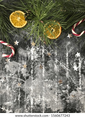 On black background Christmas tree and stars, bob bob, orange