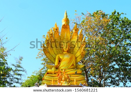  Buddha statues with blue sky