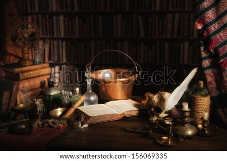 Halloween scene of a medieval alchemist kitchen or laboratory Royalty-Free Stock Photo #156069335