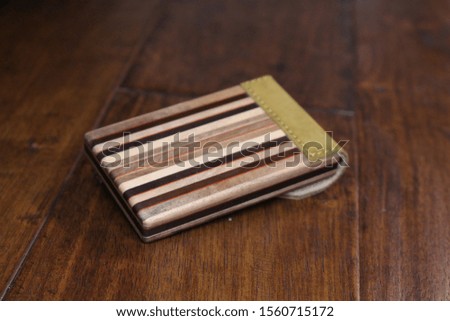 Wooden box with card holder inside made out of wood	