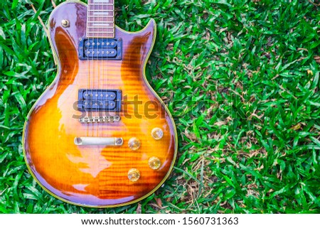 
Guitar on the backgroud field