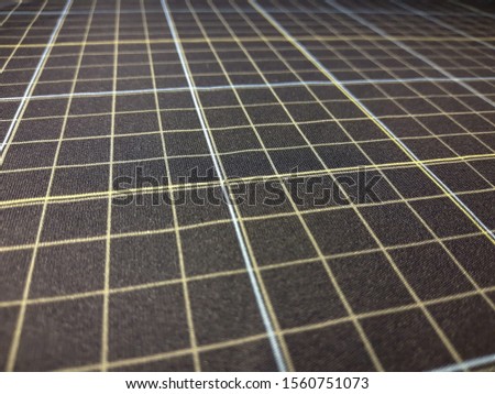 gray check print on fabric on background