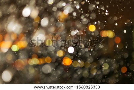 Abstract bokeh of water and light