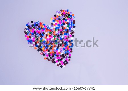 Colored heart from pyssla. Creative concept