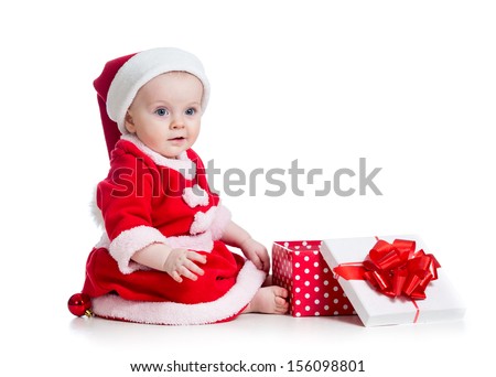 x-mas baby girl opening gift box isolated on white background