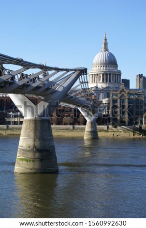 London, UK: view of the Millennium Bridge and the dome of St. Paul's Cathedral