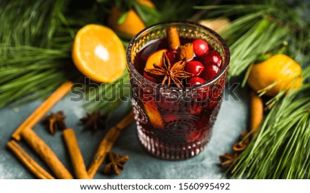 Mulled red wine on the rustic background. Selective focus. Shallow depth of field.