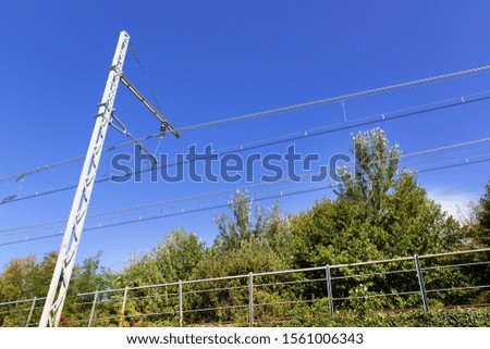 Electricity railway road lines train company on summer blue sky tourism cargo transport logistic industry