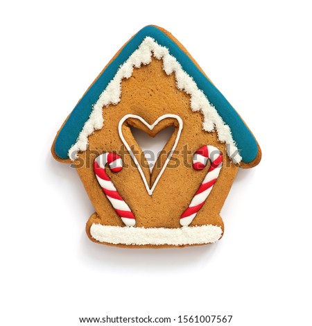 Gingerbread house on a white background isolated. Festive Christmas baking. Flat lay