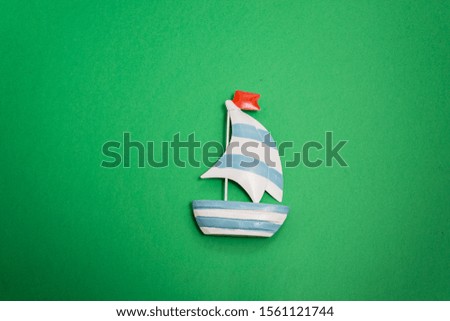 Miniature of a blue and white craft boat