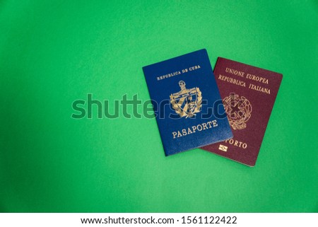 Official Cuban and Italian passport with green background Royalty-Free Stock Photo #1561122422