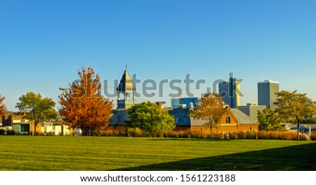 View of Kansas City, Missouri, in fall before sunset; view from a hill