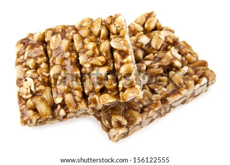 roasted nuts with sugar isolated on whit. One picture from series.