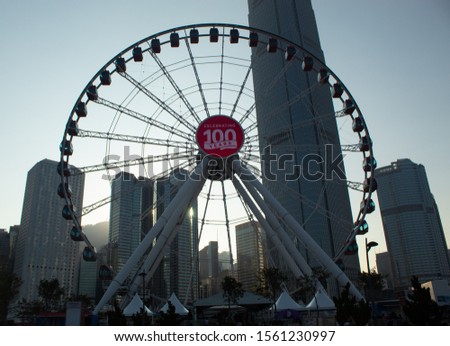 Hong Kong Observation Wheel with city background
