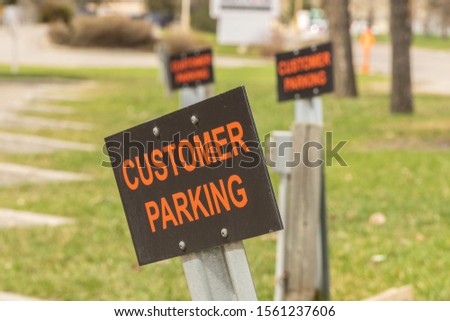 Customer Parking Signs in fron of an office block