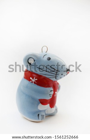Christmas rat symbol of the New Year 2020.  Blue porcelain rat figure, isolated white