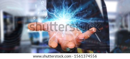 Businessman on blurred background creating renewable and sustainable eco energy 3D rendering