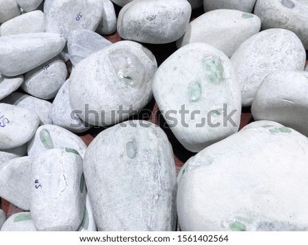 Jade stone of white and gray background.