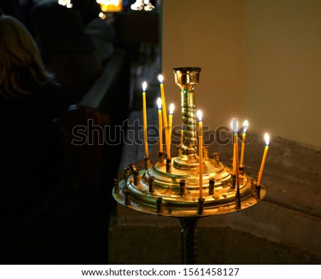 Burning candles in the church. Candle Lights Background