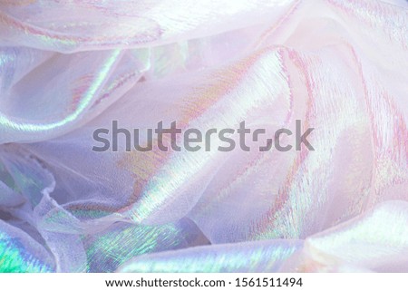 Shiny holographic iridescent bokeh background. Abstract wallpaper.