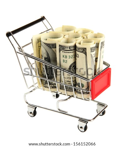 Shopping trolley with dollars, isolated on white