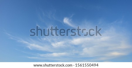 Fascinating white clouds in the blue sky