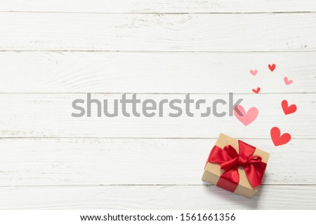 Gift and heart shapes background