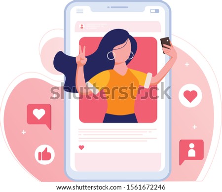 Influencer or Social Media Model taking picture of herself to be posted online Royalty-Free Stock Photo #1561672246