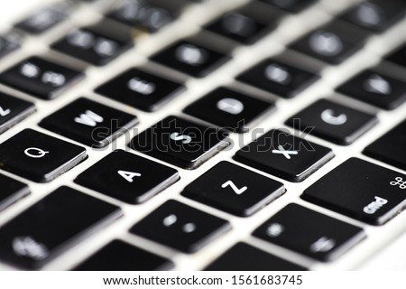 closeup shot of computer keyboard  Royalty-Free Stock Photo #1561683745