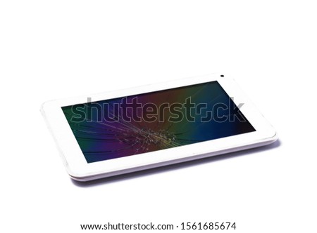White tablet computers with broken display on isolated white background.