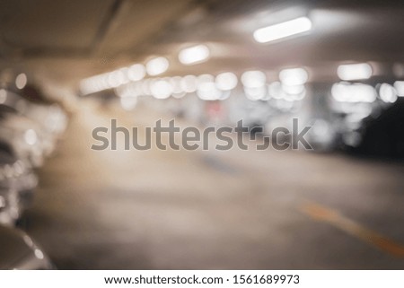 Blurred image, Parking garage - car park, underground parking with cars.