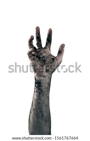 Zombie hand dirty with soil isolated on white background Royalty-Free Stock Photo #1561767664