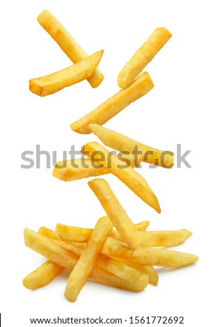 Falling french potato fries, isolated on white background Royalty-Free Stock Photo #1561772692