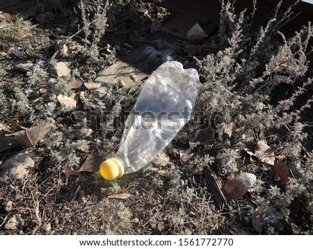 Plastic bottle waste in the nature. Plastic pollution concept