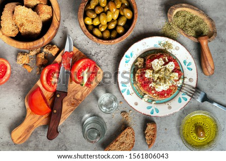 Cretan food raki with olive oil Royalty-Free Stock Photo #1561806043