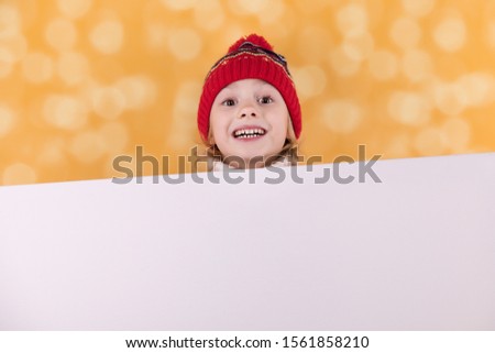 Christmas child kid girl with empty banner copyspace