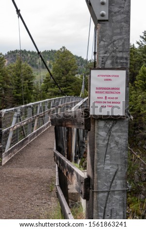 Warning Sign About Stock Bridge Crossing Over Hellroaring Creek