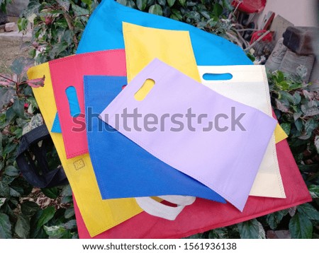 Recyclable Eco bags on leaves, Custom Color Non Woven Reusable Tote and Shopping Bags,