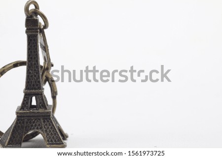 Eifel key chain souvenir on a White backgound